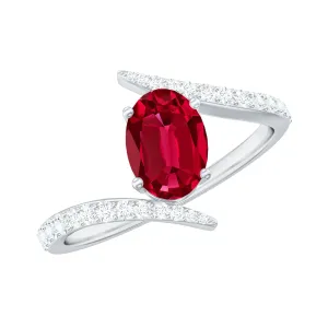 1.5 CT Oval Lab Created Ruby Solitaire Bypass Ring with Diamond