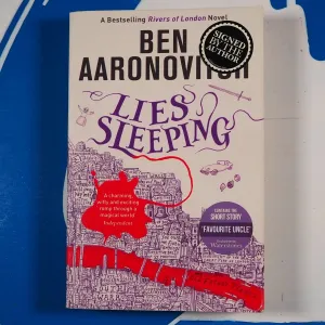 Lies Sleeping: The Seventh Rivers Of London Novel (Paperback) By Ben Aaronovitch USED PAPERBACK.  SIGNED. Condition Very Good  ISBN 10 1473207835 ISBN 13 9781473207837