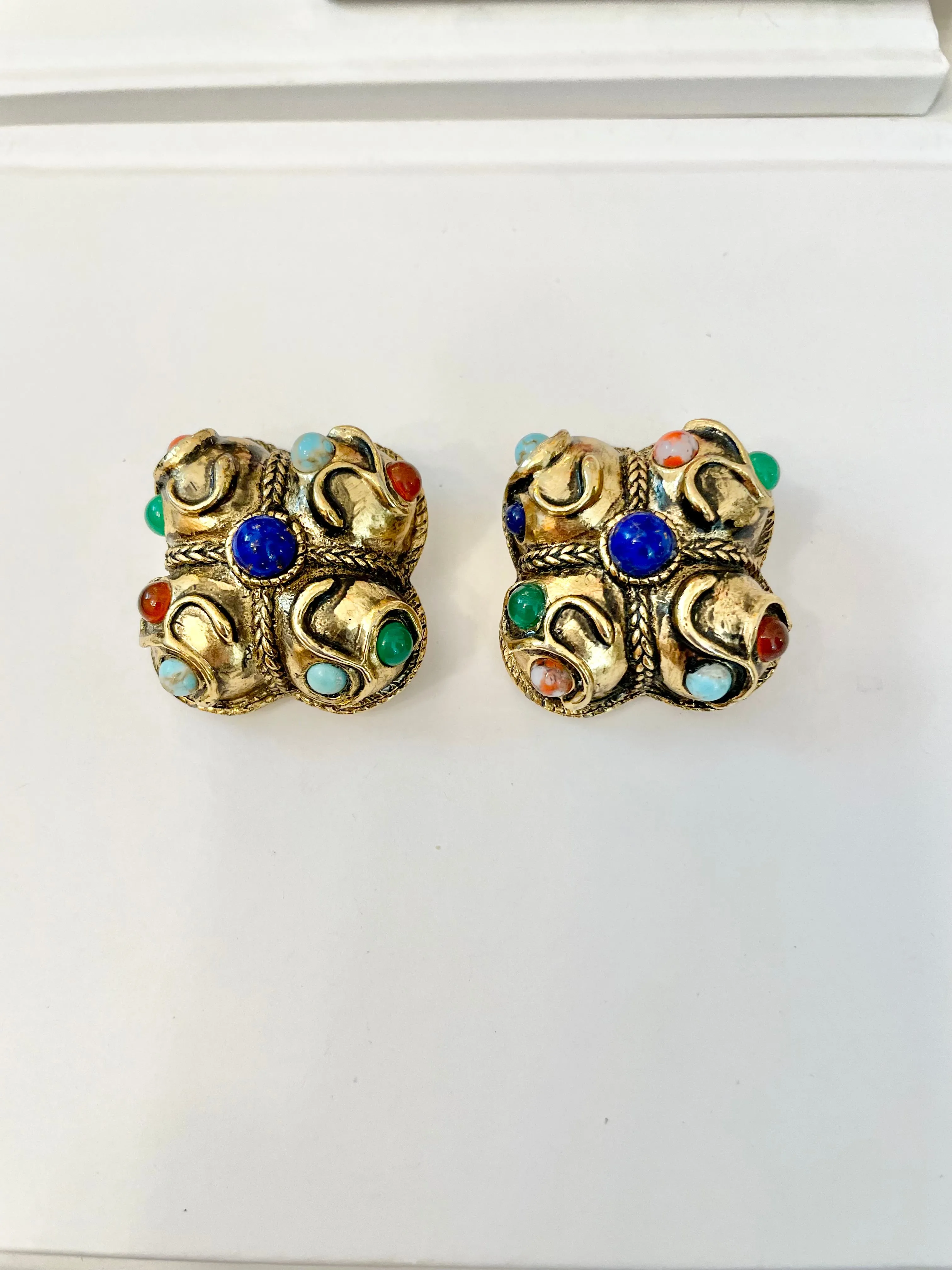 The Socialite and her love for the finest gems! These delightful gold and colorful gem earrings are extraordinary!!